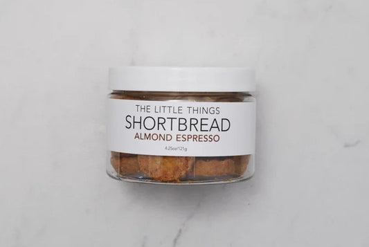 Jar of 'Shortbread Almond Espresso' by 'The Little Things' on a light gray background