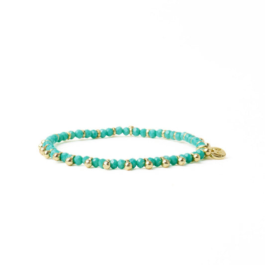 Kami Crystal + Brass Charm Stretch Bracelet in Teal + Gold by Ink & Alloy